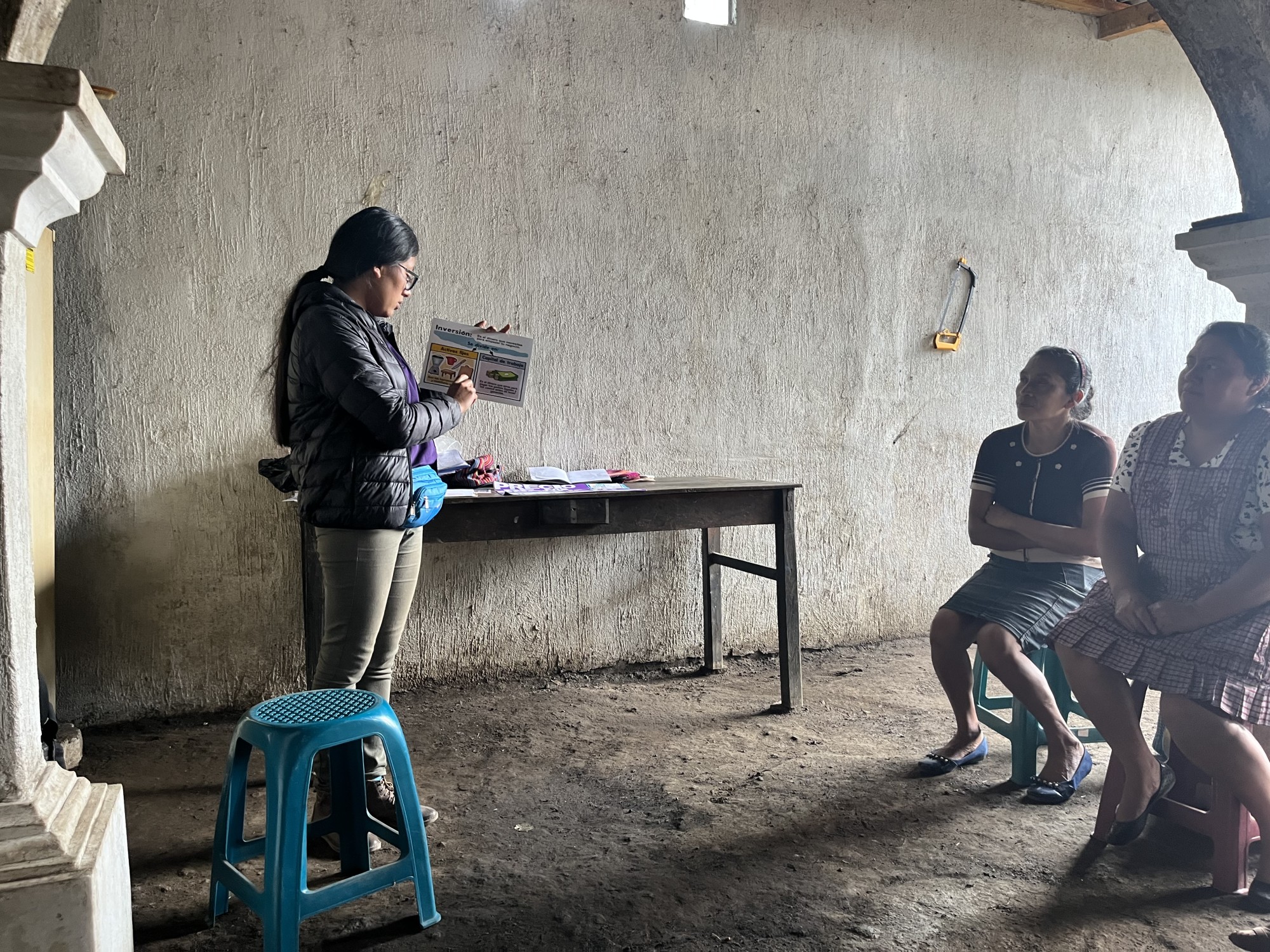 A monthly Trust Bank meeting with Friendship Bridge's clients