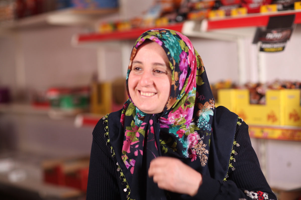 Feride in Turkiye took a loan to increase supplies for her store. 