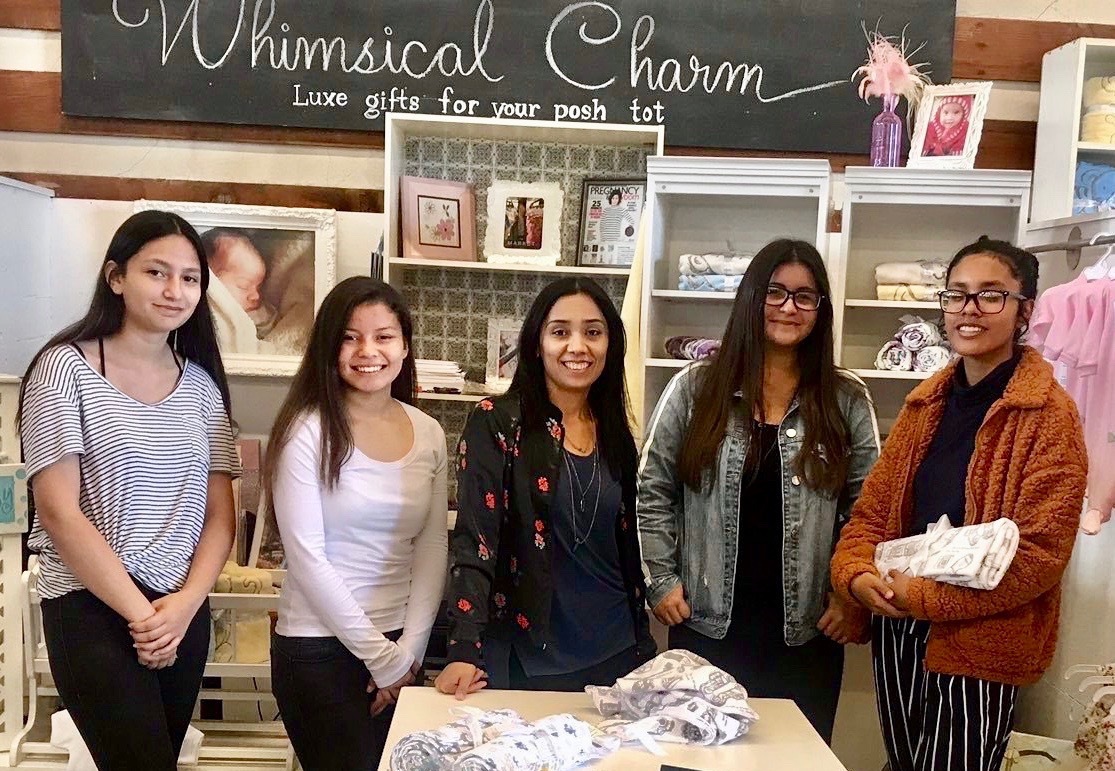 Rosie, Founder of Whimsical Charm, used a Kiva loan to help grow her business and pay it forward in her local community