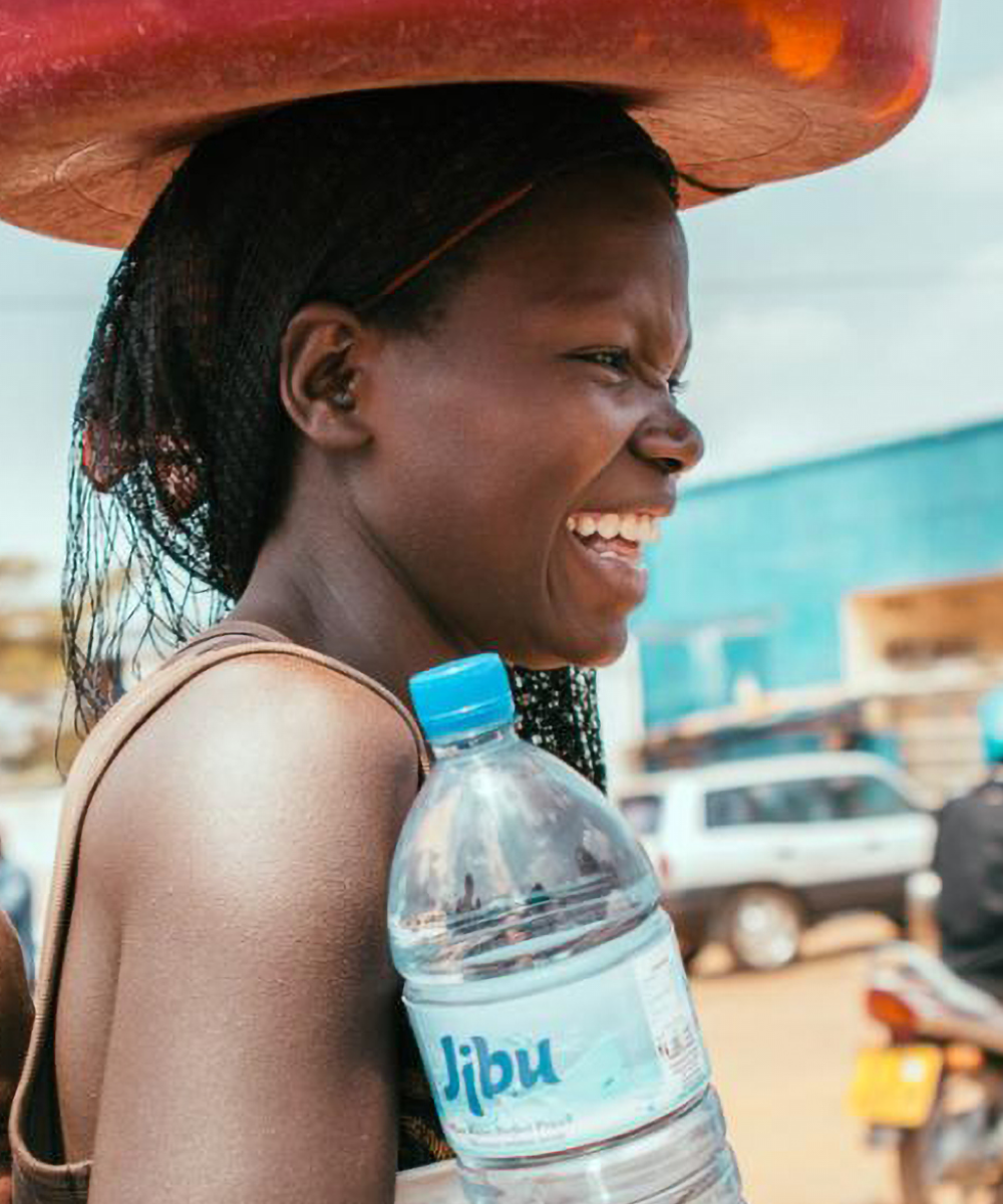 jibu partners with local entrepreneurs to produce and distribute safe drinking water within their communities.